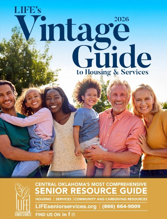 Cover image of 'Life's Vintage Guide 2026' to housing and services, featuring a diverse group of smiling family members outdoors under a blue sky.